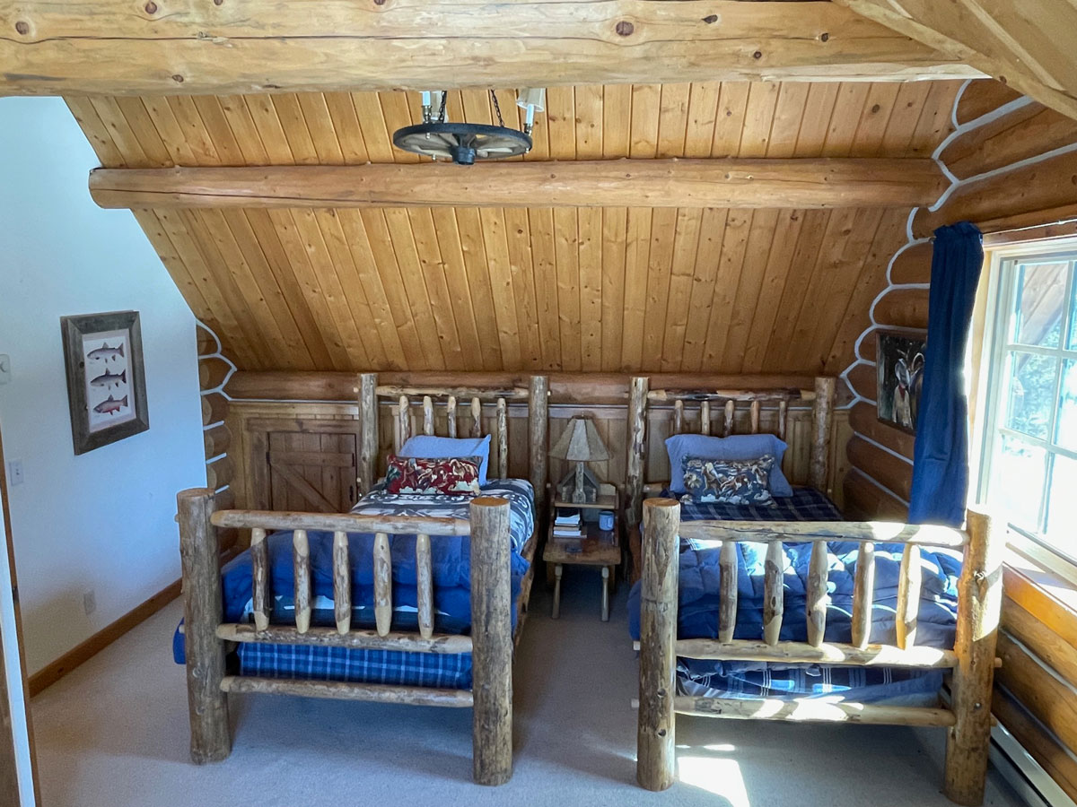 Twin beds in ranch house guest room